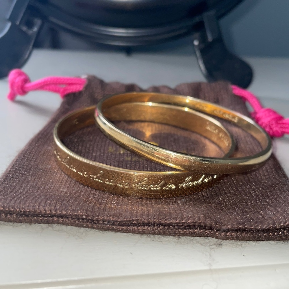 Set of 2 Kate Spade goldtone bangle bracelets Hand in Hand & Heart of Gold